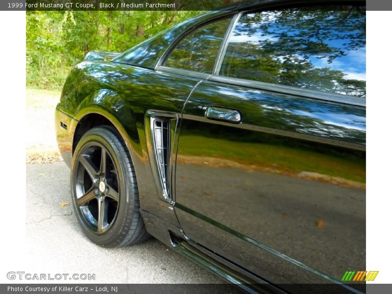 Black / Medium Parchment 1999 Ford Mustang GT Coupe