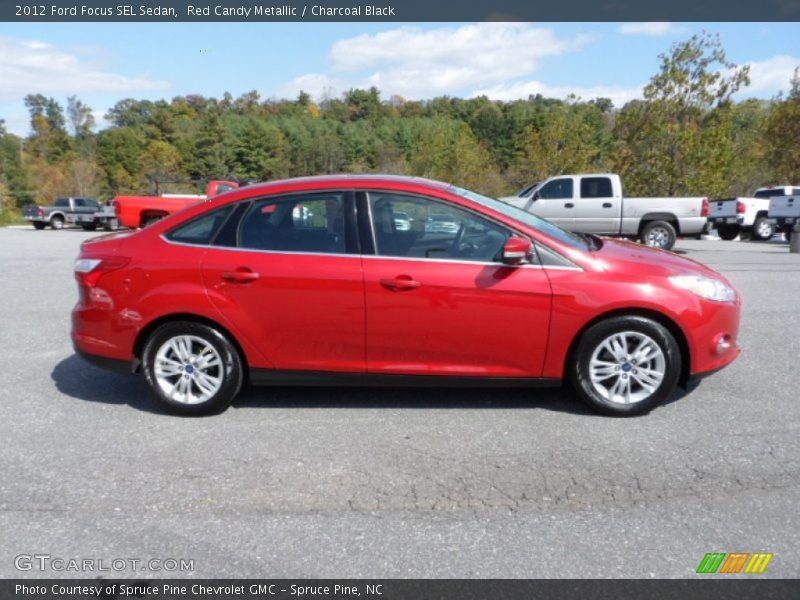 Red Candy Metallic / Charcoal Black 2012 Ford Focus SEL Sedan