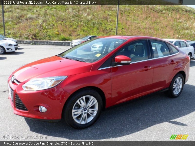 Red Candy Metallic / Charcoal Black 2012 Ford Focus SEL Sedan