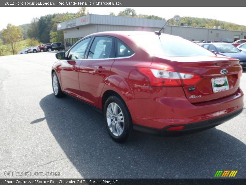 Red Candy Metallic / Charcoal Black 2012 Ford Focus SEL Sedan