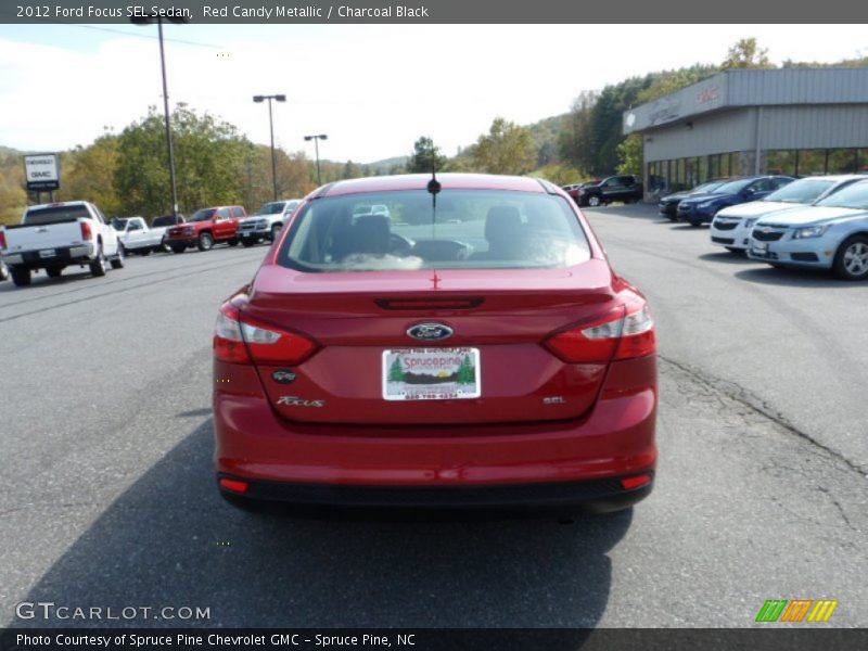 Red Candy Metallic / Charcoal Black 2012 Ford Focus SEL Sedan