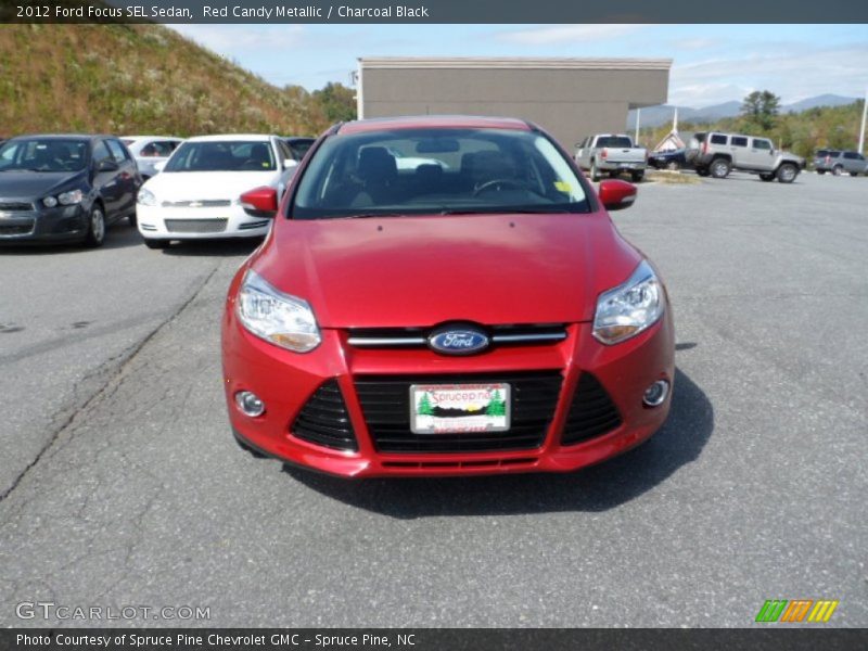 Red Candy Metallic / Charcoal Black 2012 Ford Focus SEL Sedan