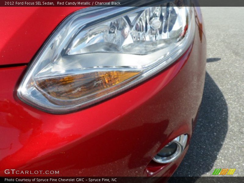 Red Candy Metallic / Charcoal Black 2012 Ford Focus SEL Sedan