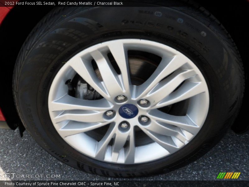 Red Candy Metallic / Charcoal Black 2012 Ford Focus SEL Sedan