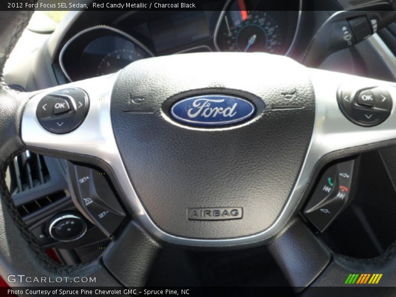 Red Candy Metallic / Charcoal Black 2012 Ford Focus SEL Sedan