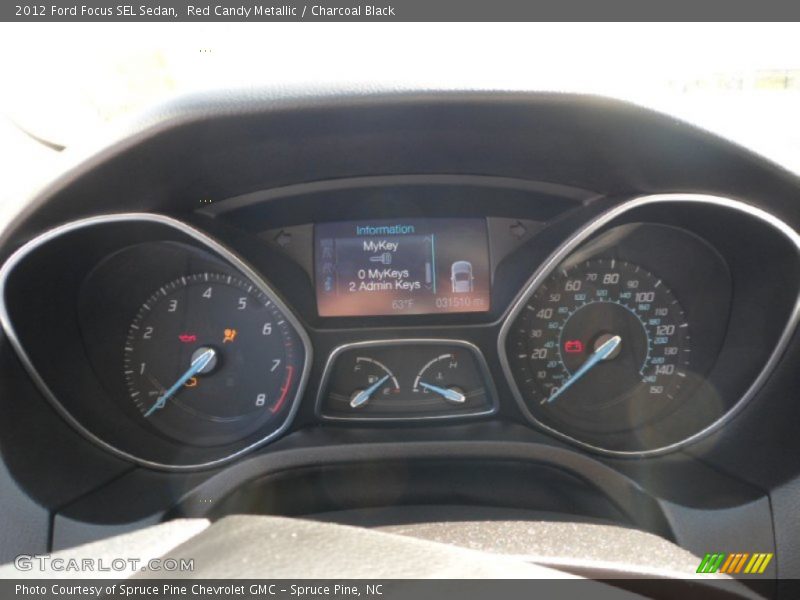 Red Candy Metallic / Charcoal Black 2012 Ford Focus SEL Sedan