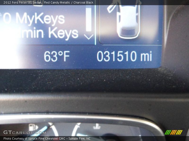 Red Candy Metallic / Charcoal Black 2012 Ford Focus SEL Sedan
