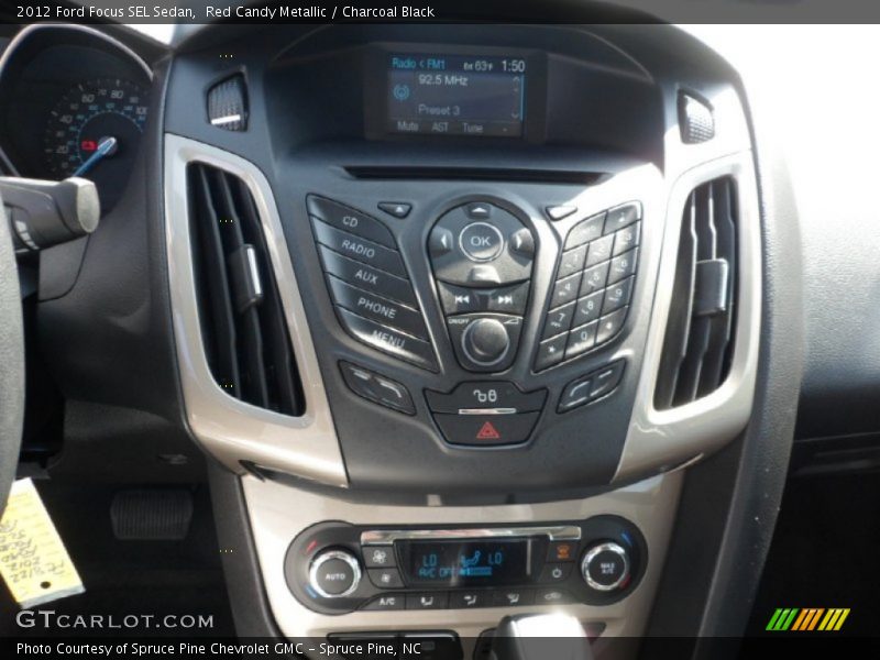 Red Candy Metallic / Charcoal Black 2012 Ford Focus SEL Sedan