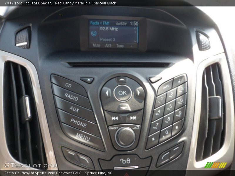 Red Candy Metallic / Charcoal Black 2012 Ford Focus SEL Sedan