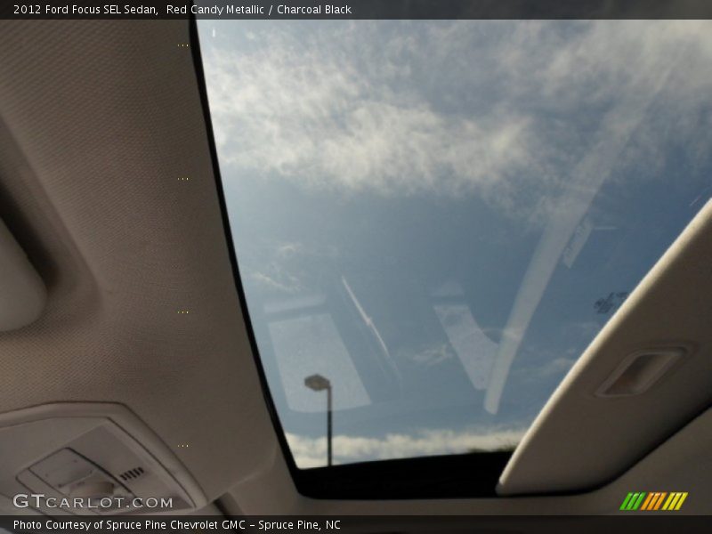 Red Candy Metallic / Charcoal Black 2012 Ford Focus SEL Sedan