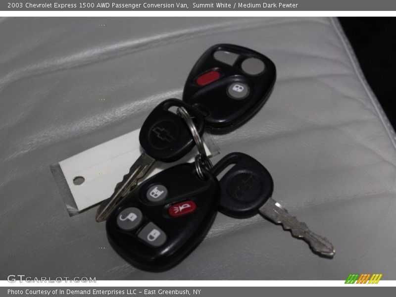 Keys of 2003 Express 1500 AWD Passenger Conversion Van