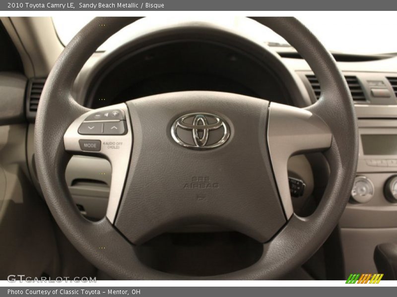 Sandy Beach Metallic / Bisque 2010 Toyota Camry LE