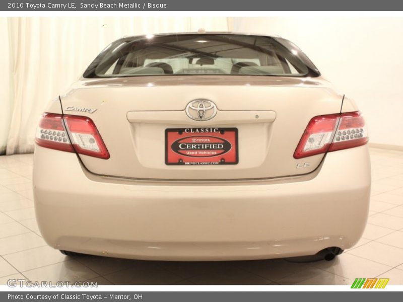 Sandy Beach Metallic / Bisque 2010 Toyota Camry LE