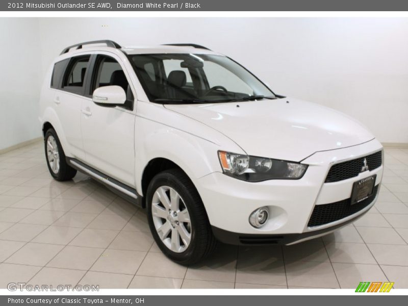 Diamond White Pearl / Black 2012 Mitsubishi Outlander SE AWD