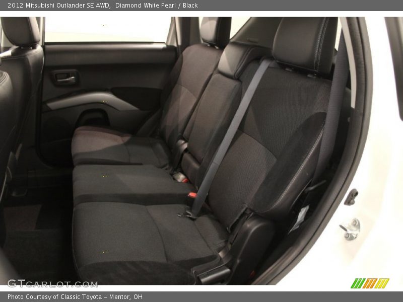 Diamond White Pearl / Black 2012 Mitsubishi Outlander SE AWD