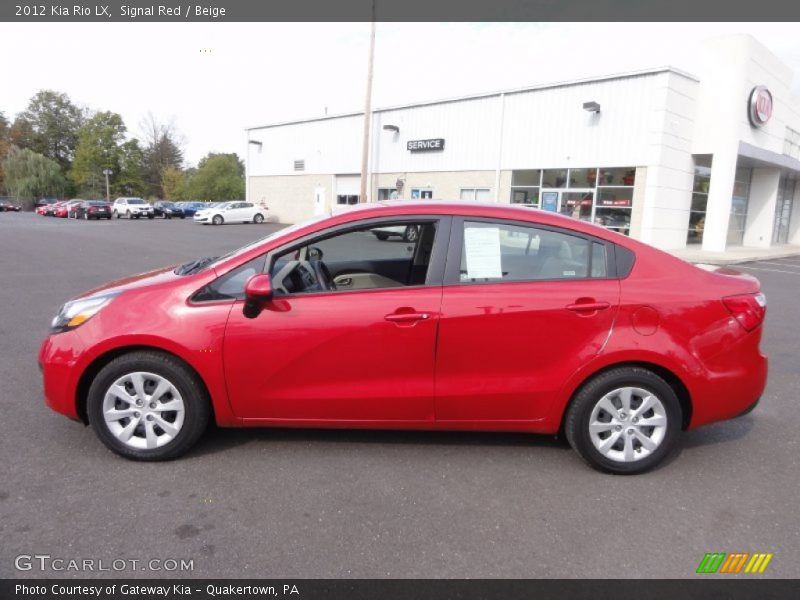  2012 Rio LX Signal Red