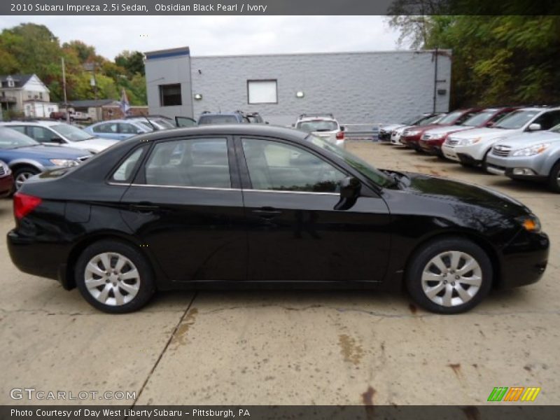 Obsidian Black Pearl / Ivory 2010 Subaru Impreza 2.5i Sedan