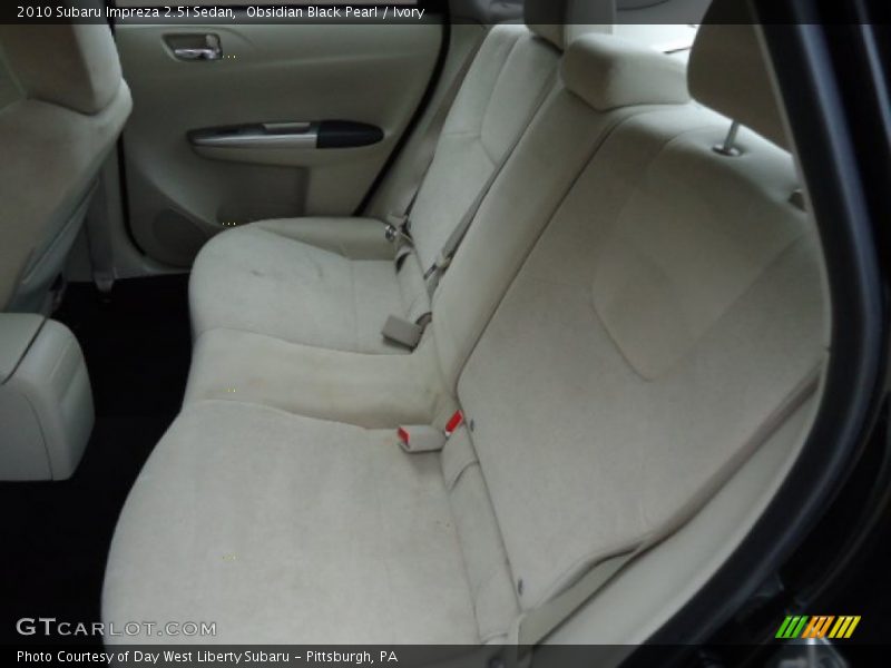 Obsidian Black Pearl / Ivory 2010 Subaru Impreza 2.5i Sedan