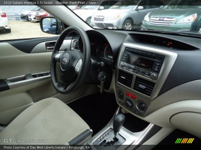 Obsidian Black Pearl / Ivory 2010 Subaru Impreza 2.5i Sedan