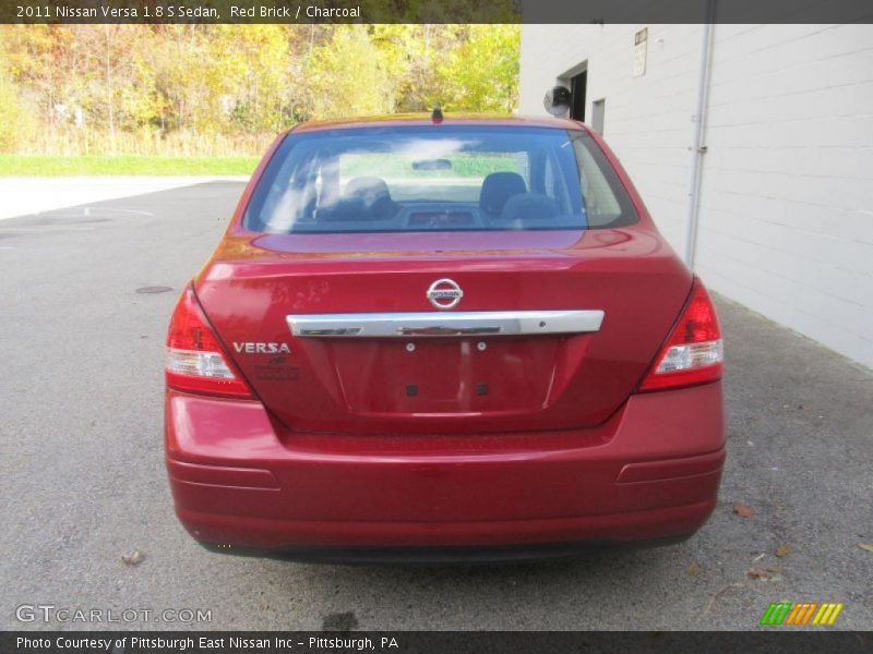 Red Brick / Charcoal 2011 Nissan Versa 1.8 S Sedan