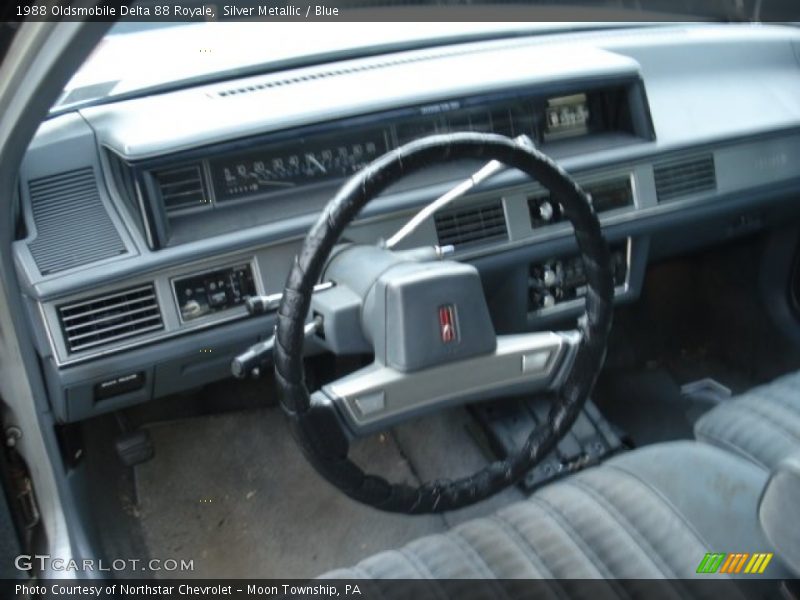 Silver Metallic / Blue 1988 Oldsmobile Delta 88 Royale