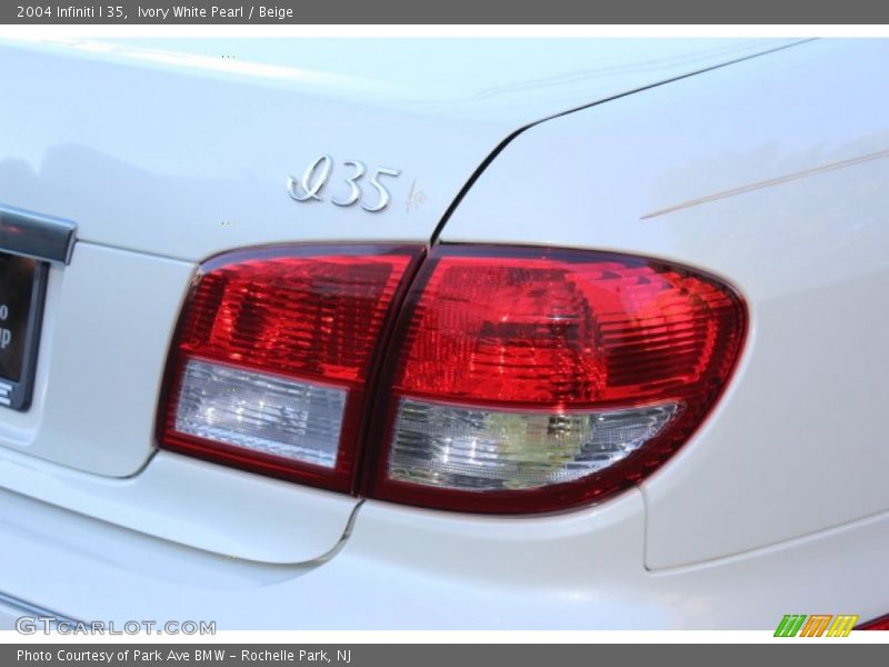 Ivory White Pearl / Beige 2004 Infiniti I 35