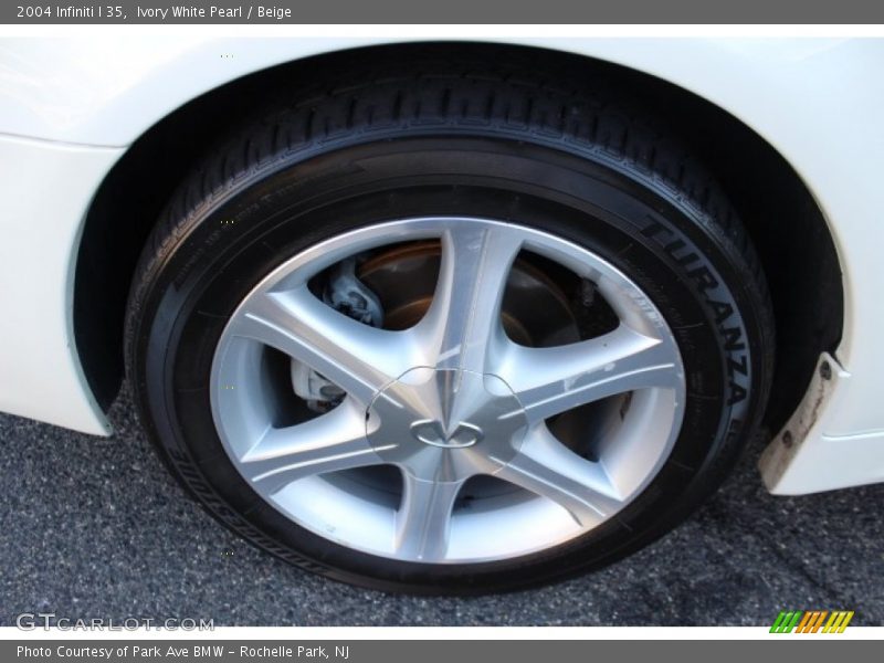 Ivory White Pearl / Beige 2004 Infiniti I 35