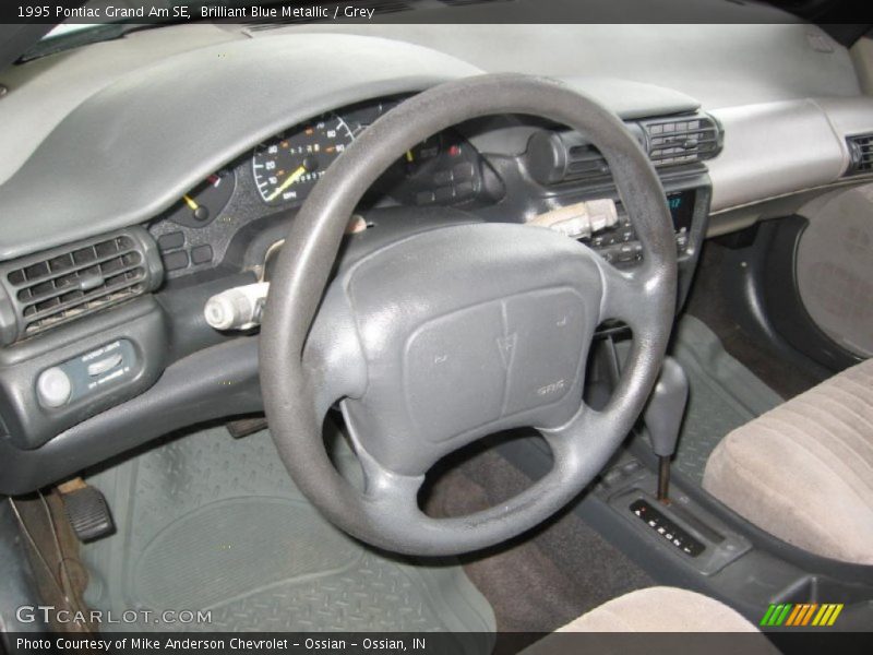 Brilliant Blue Metallic / Grey 1995 Pontiac Grand Am SE