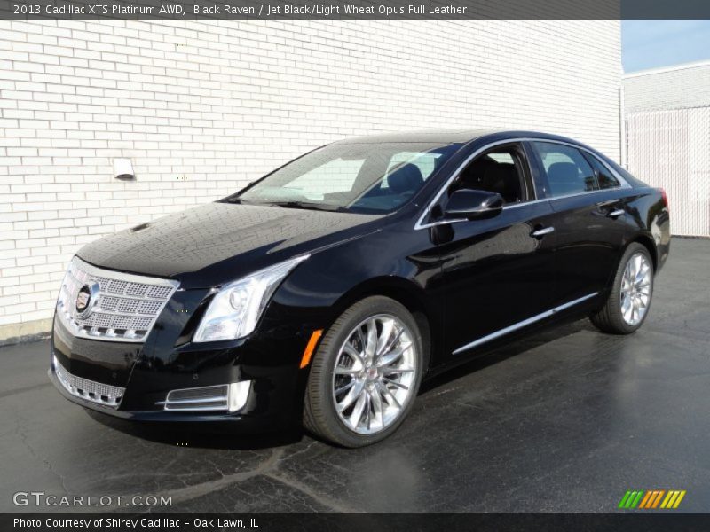 Front 3/4 View of 2013 XTS Platinum AWD