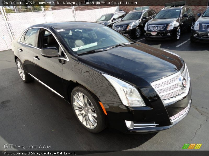 Front 3/4 View of 2013 XTS Platinum AWD