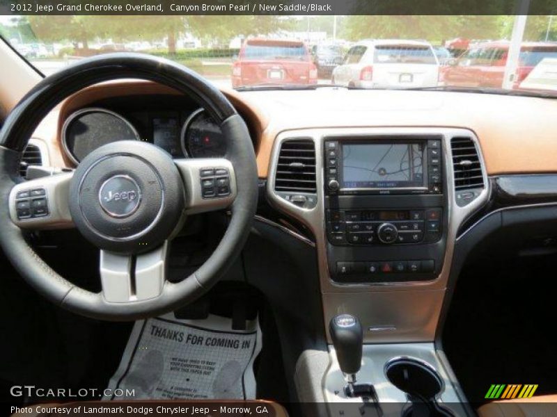 Canyon Brown Pearl / New Saddle/Black 2012 Jeep Grand Cherokee Overland