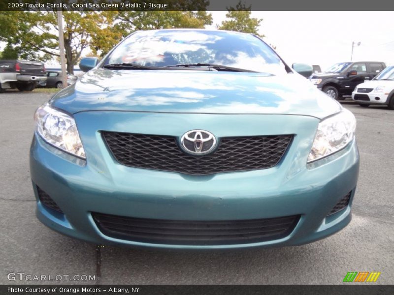 Capri Sea Green Metallic / Bisque 2009 Toyota Corolla