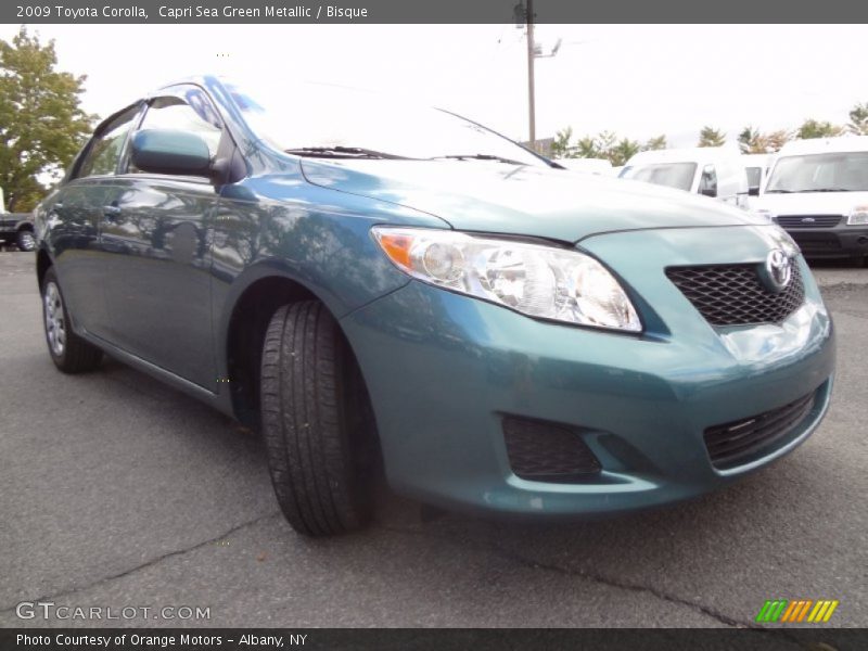 Capri Sea Green Metallic / Bisque 2009 Toyota Corolla