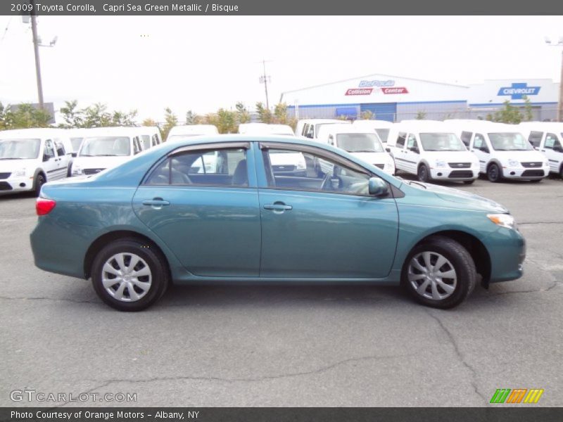 Capri Sea Green Metallic / Bisque 2009 Toyota Corolla