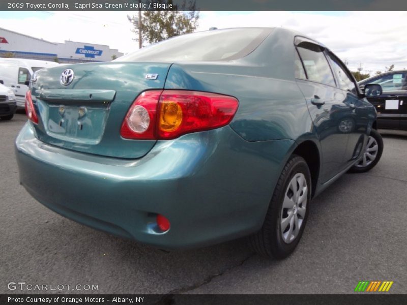 Capri Sea Green Metallic / Bisque 2009 Toyota Corolla