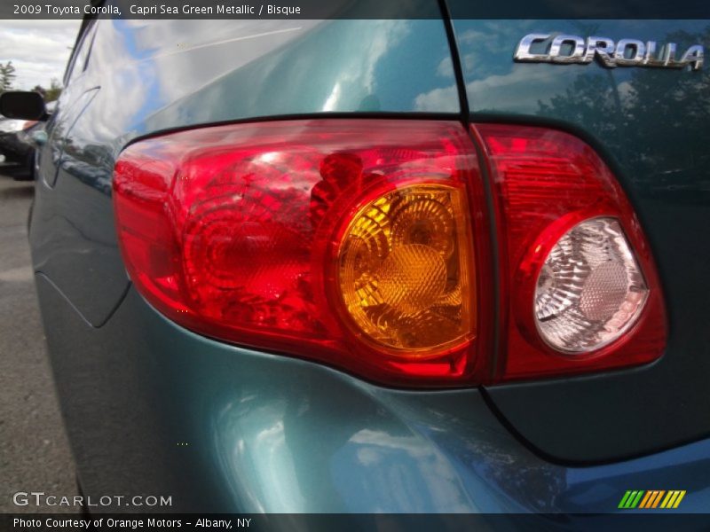 Capri Sea Green Metallic / Bisque 2009 Toyota Corolla