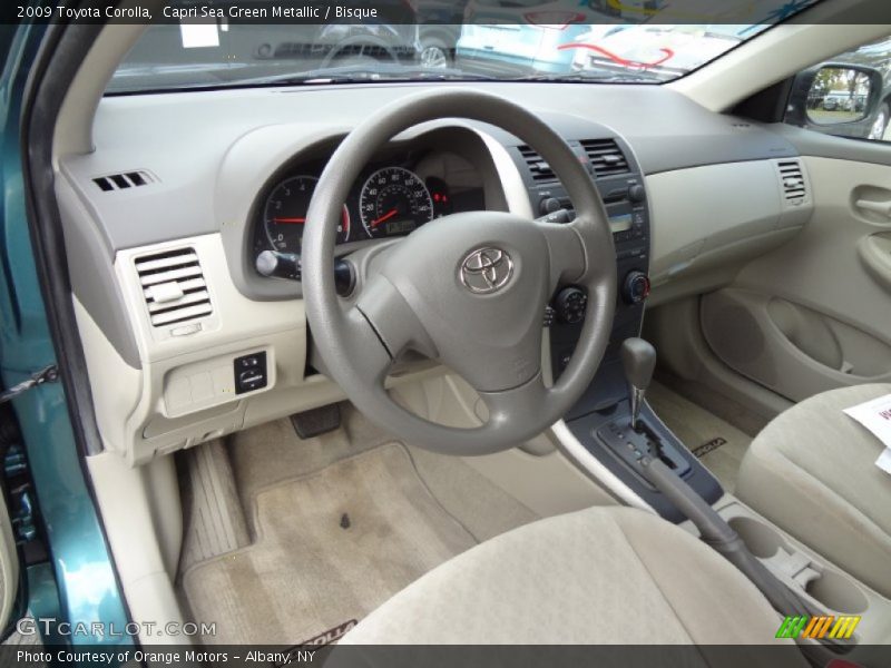 Capri Sea Green Metallic / Bisque 2009 Toyota Corolla