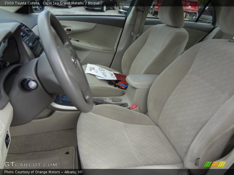 Capri Sea Green Metallic / Bisque 2009 Toyota Corolla