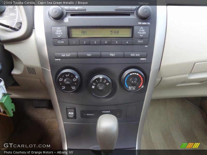 Capri Sea Green Metallic / Bisque 2009 Toyota Corolla