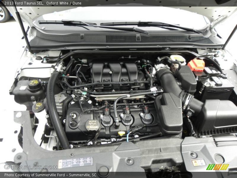 Oxford White / Dune 2013 Ford Taurus SEL