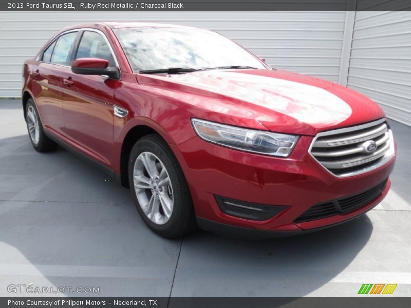 Ruby Red Metallic / Charcoal Black 2013 Ford Taurus SEL