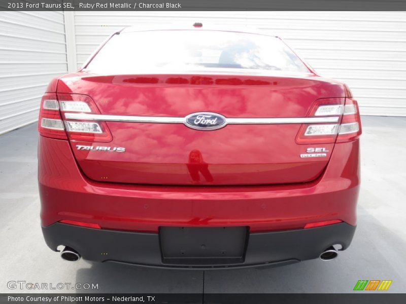 Ruby Red Metallic / Charcoal Black 2013 Ford Taurus SEL