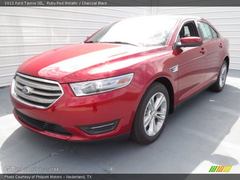 Ruby Red Metallic / Charcoal Black 2013 Ford Taurus SEL