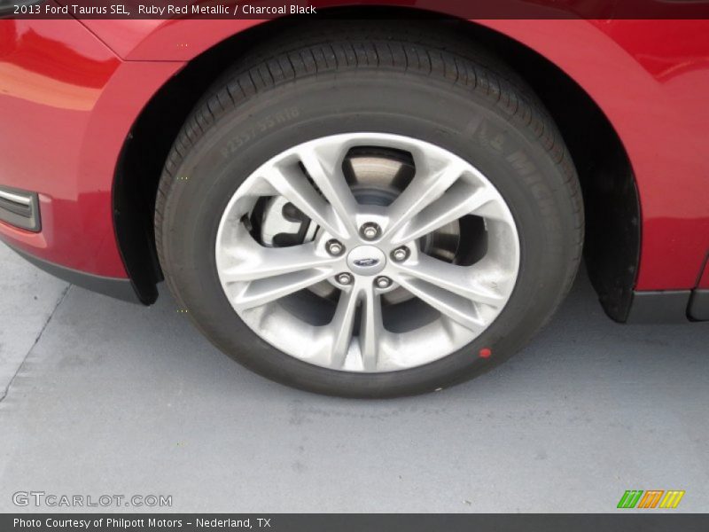 Ruby Red Metallic / Charcoal Black 2013 Ford Taurus SEL