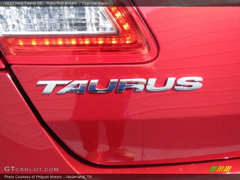 Ruby Red Metallic / Charcoal Black 2013 Ford Taurus SEL