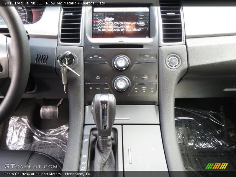 Ruby Red Metallic / Charcoal Black 2013 Ford Taurus SEL