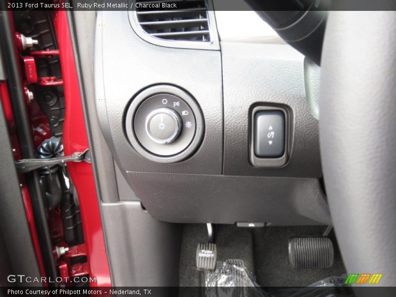 Ruby Red Metallic / Charcoal Black 2013 Ford Taurus SEL