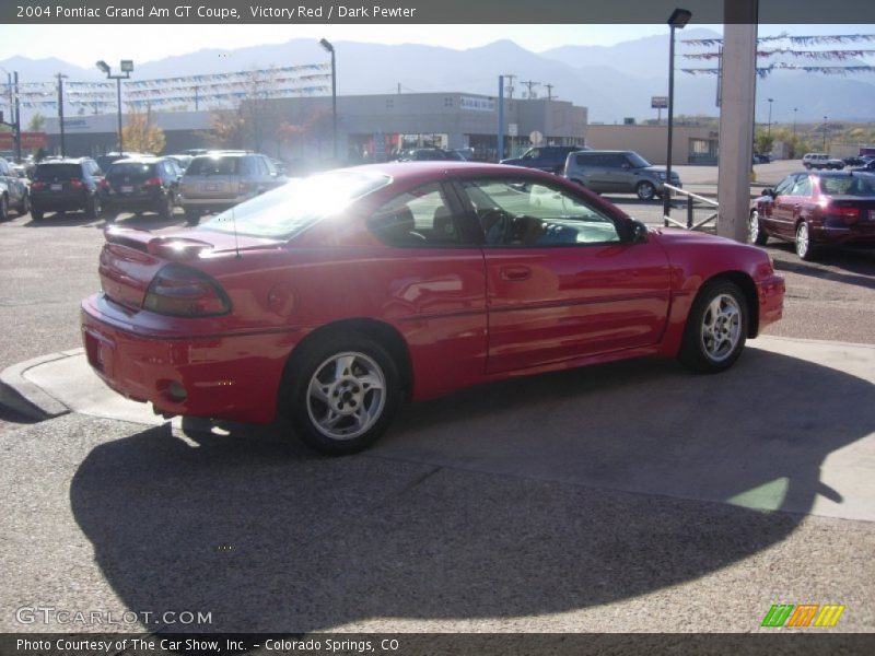 Victory Red / Dark Pewter 2004 Pontiac Grand Am GT Coupe