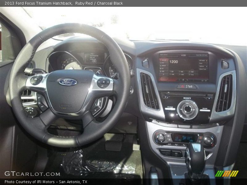 Ruby Red / Charcoal Black 2013 Ford Focus Titanium Hatchback