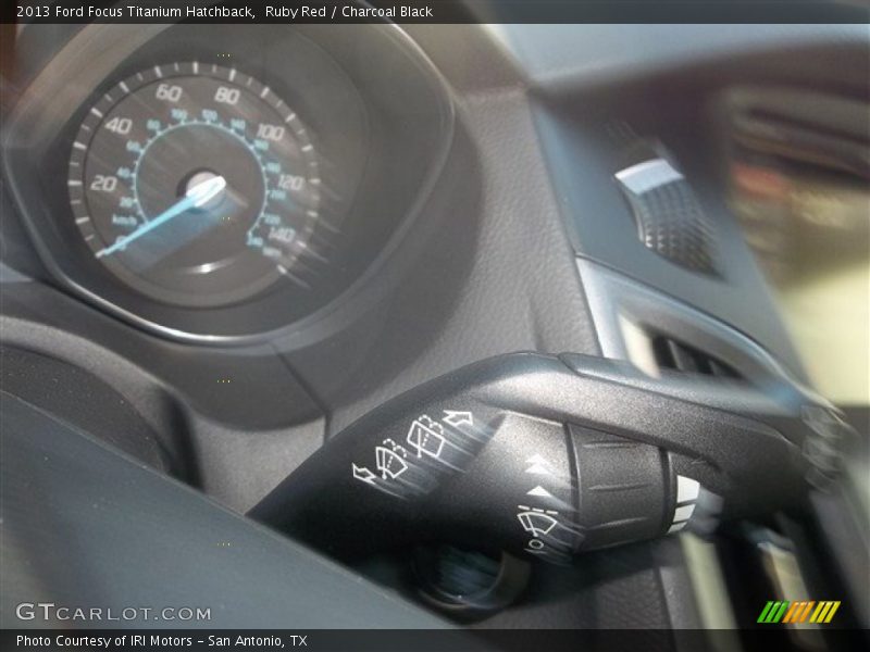 Ruby Red / Charcoal Black 2013 Ford Focus Titanium Hatchback